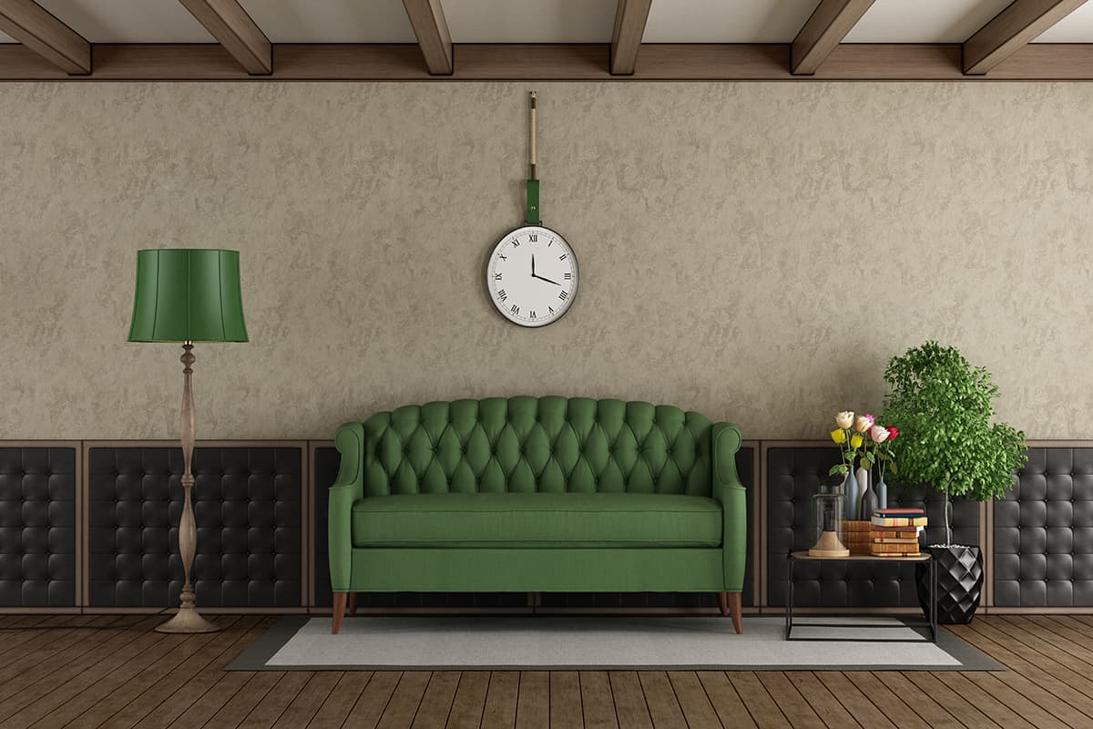 Classic living room with green sofa